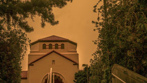 a gloomy photo of a red sky over Humboldt State University