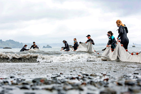 students with nets at Trinidad beach